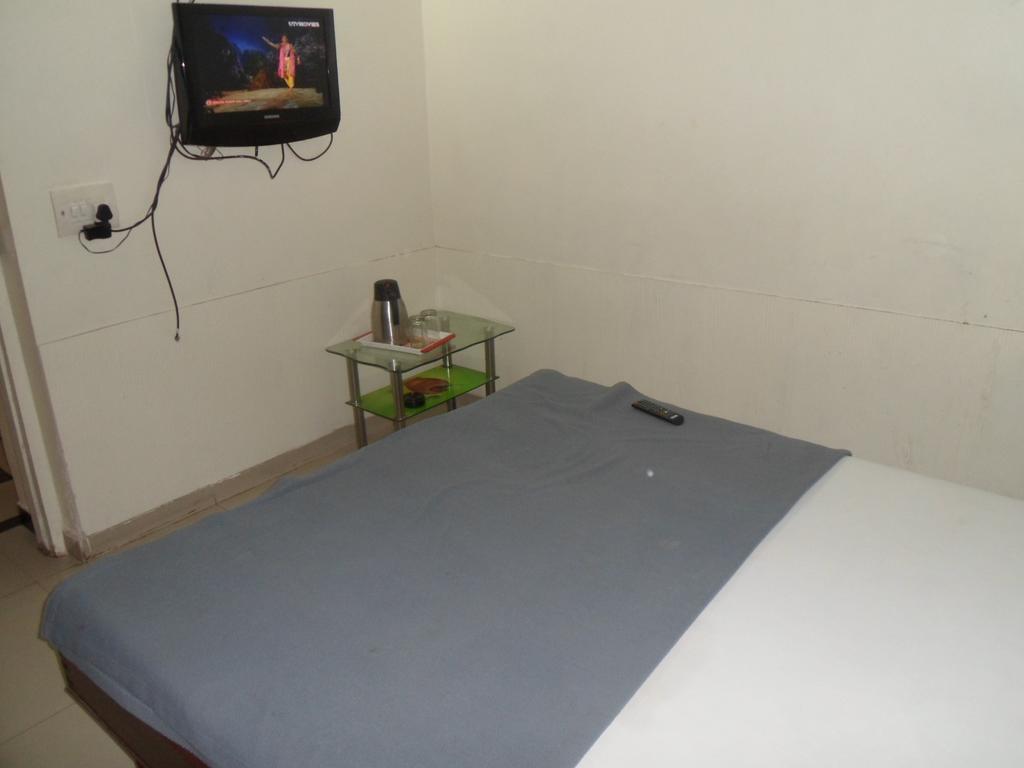 Hotel Atithi Ahmadábád Szoba fotó