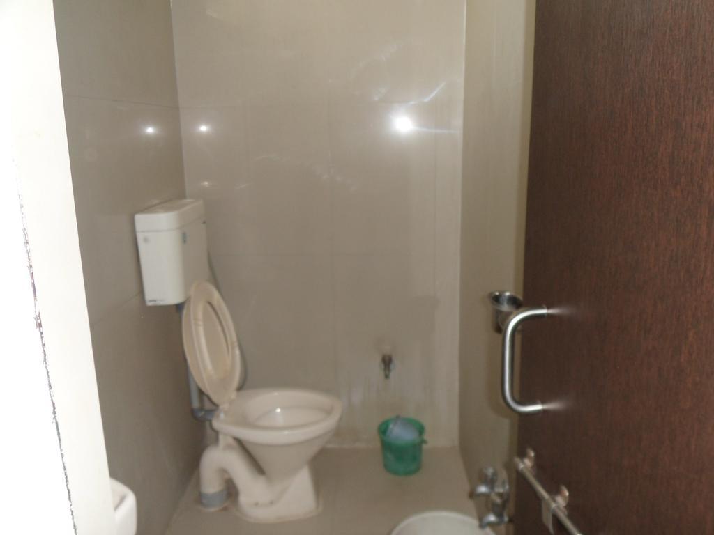 Hotel Atithi Ahmadábád Szoba fotó